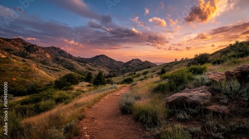 Sunset on a hiking trail through the hills