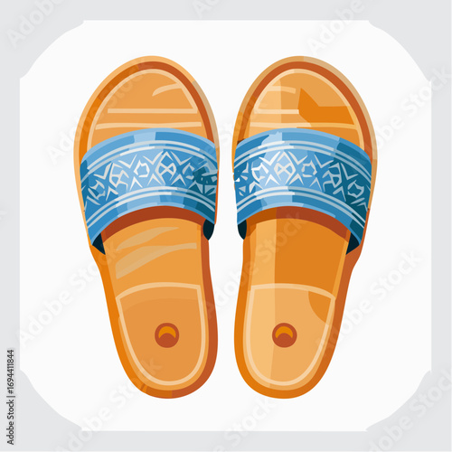 pair of orange sandals with blue patterned straps