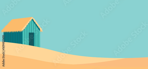 A teal beach hut with a thatched roof sits on a sandy dune perfect for summer vacation and travel