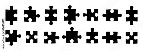 Collection of Black Puzzle Pieces on White Background