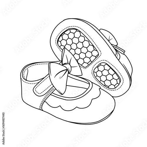 A black and white outline drawing of a pair of baby girl shoes. One shoe features a cute bow and scalloped trim while the other displays its honeycomb patterned sole.