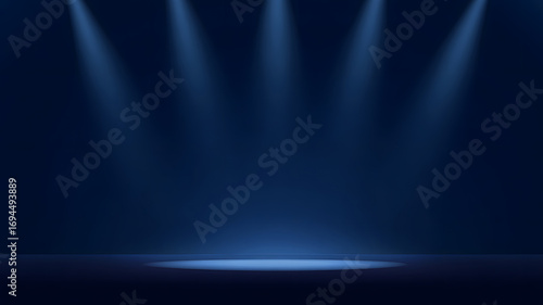Dramatic dark blue stage with spotlight beams creating an inviting spotlight on a glowing podium for presentations