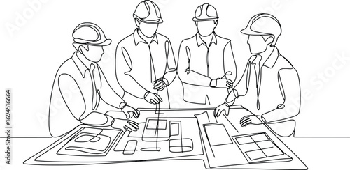 Diverse team of engineers collaborating on construction blueprints for project planning