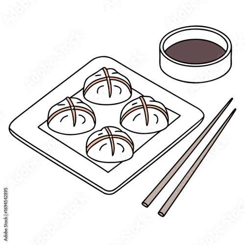 Dumplings on plate with chopsticks and dipping sauce  