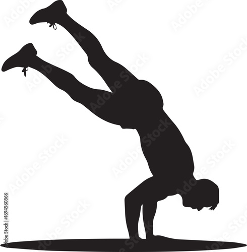 Muscular fitness athlete silhouette performing a dynamic handstand pose demonstrating strength and agility