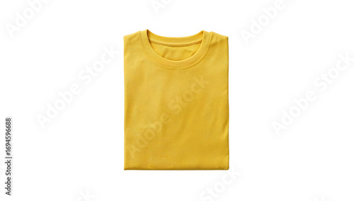 Close up studio shot of folded yellow t-shirt on an isolated black background offering a