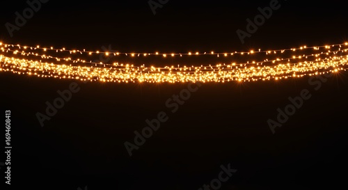 Glowing string lights against a dark background for festive or decorative design elements