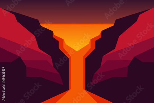 The lonely road to the mountains stretches toward the red and orange sky at sunset