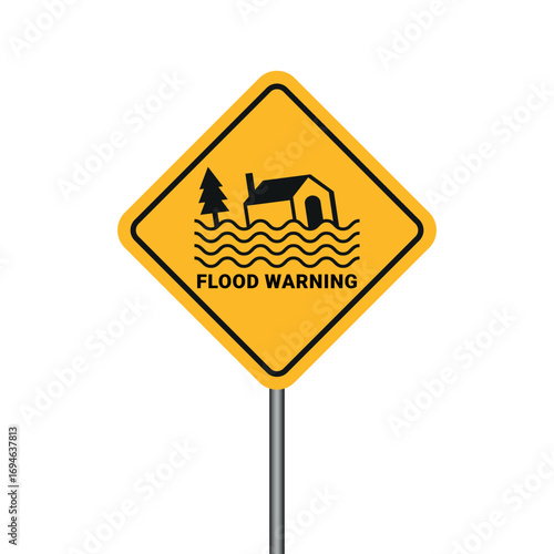 yellow diamond road sign showing flood warning with house and tree partially submerged in water waves, safety caution