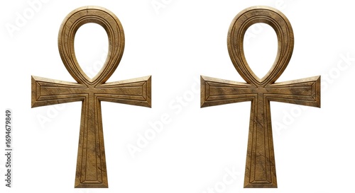 Two stone ankhs stand sidebyside against a white backdrop