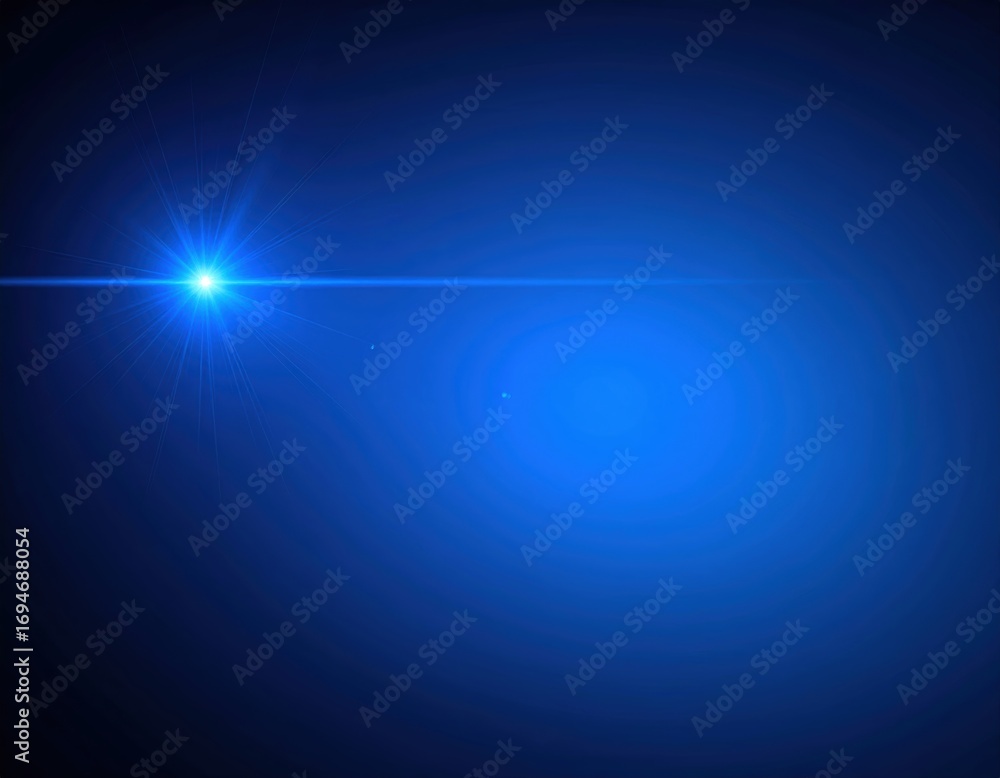 Obraz premium Abstract Light Blue Lens Flare Glow Over Black Background