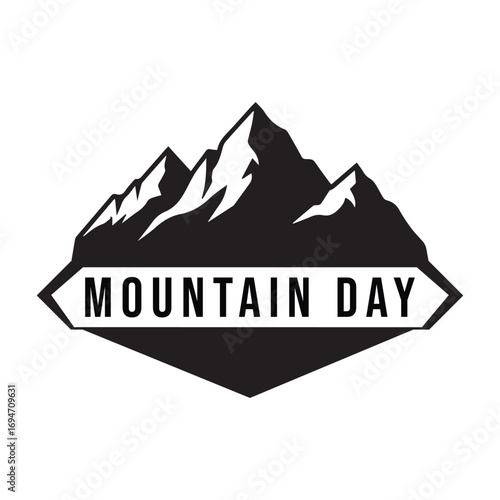 Mountain day emblem with jagged peaks and bold text