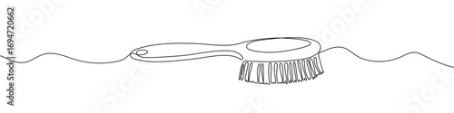 Brush in one line art style. Drawing of a hairbrush with an editable black stroke on a white background. Vector illustration.