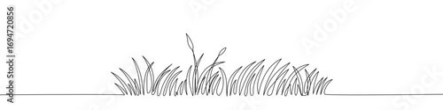 Grass in one line art style. Drawing of grass with an editable black stroke on a white background. Vector illustration.