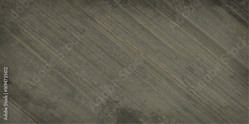 Sandy dunes create an abstract pattern of ripples across the dry landscape under a vast summer sky