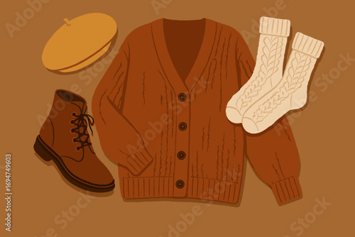 Autumn Fashion Essentials. Vector illustration of autumn fashion flat lay featuring woolen cardigan, leather boots, beret, and