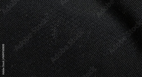 Black twill fabric texture closeup.