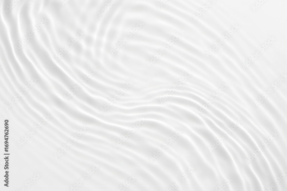 Obraz premium Abstract white ripples and waves on a clean surface creating a gentle flowing texture
