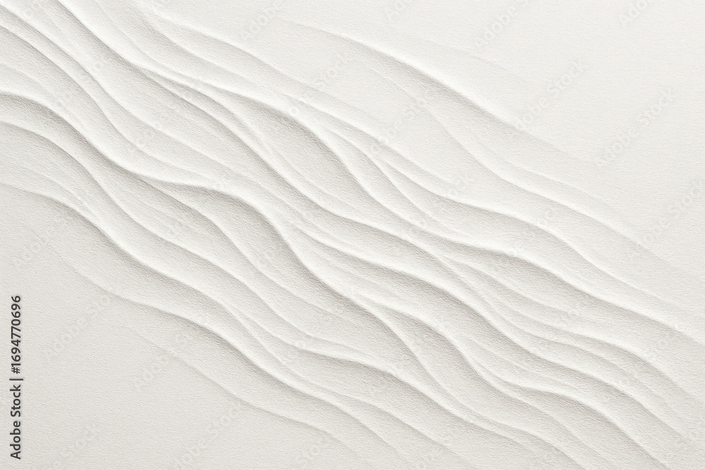 Obraz premium Abstract close up of gentle wavy sand ripples on a bright sunny beach with soft light