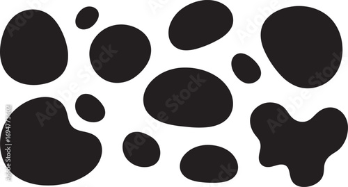 A versatile collection of diverse irregular black shapes, reminiscent of organic blotches or abstract ink spots, perfect for modern graphic design elements and creative project backgrounds