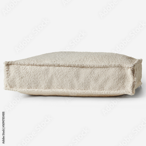 Comfortable square floor cushion resting on white background