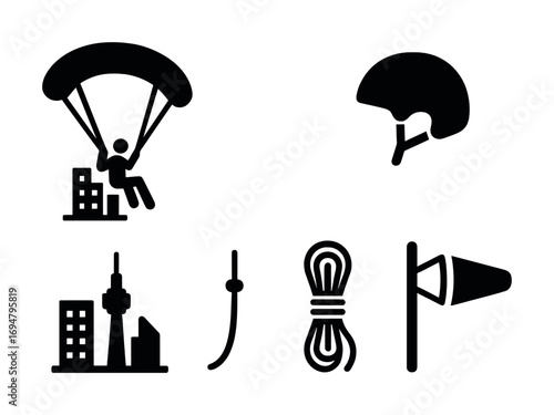 Paragliding icons set: parachute, helmet, rope, wind indicator, cityscape