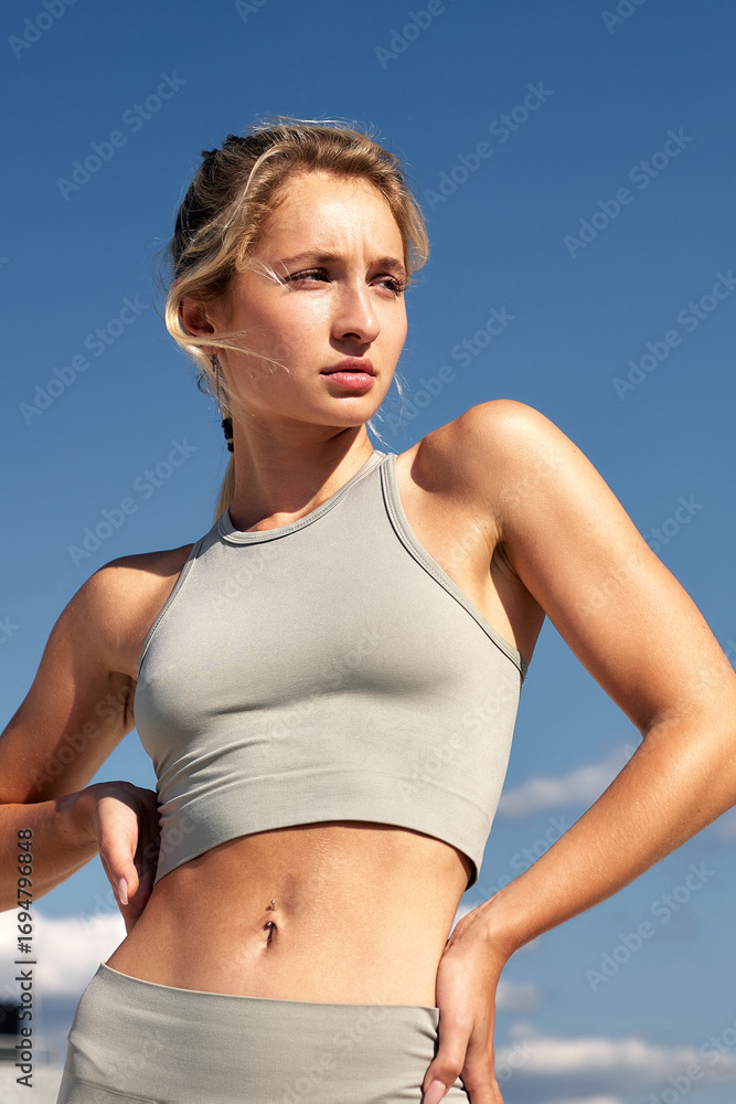 custom made wallpaper toronto digitalAthletic Woman in Sportswear Posing Outdoors Underneath a Clear Blue Sky