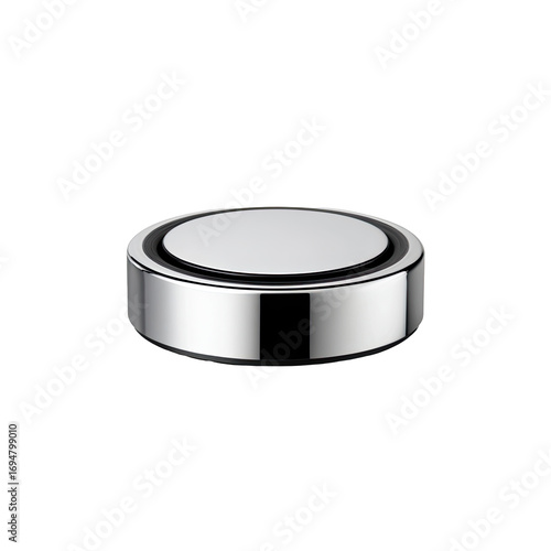 Silver button battery on black background, close-up