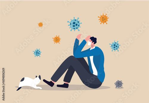 Coronavirus pandemic fatigue, exhausted from being alone or stressed from COVID-19 quarantine lockdown for long time concept, fatigue depressed man sitting sadly alone with cat in his quarantine home