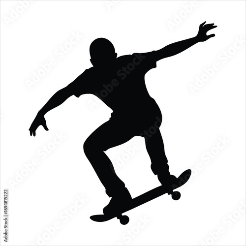 Silhouette of a skateboarder performing a trick against a white background