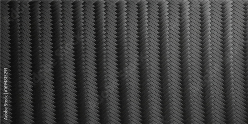 Close up of an abstract black tire track pattern with an industrial texture and metallic pipe thread