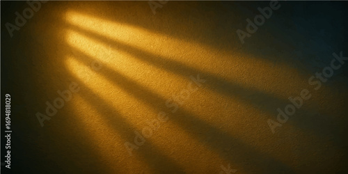 Dark night sky with golden sun rays over a blurred highway texture
