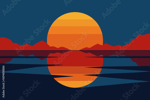 Vibrant sunset over calm water with mountain silhouette reflection