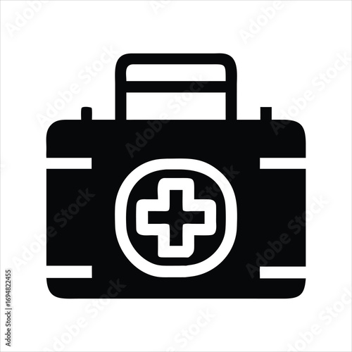 Black and white icon of a first aid kit with a medical cross