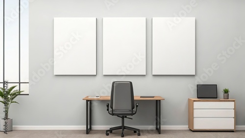 Blank triptych canvases on office wall above desk for mockup presentation