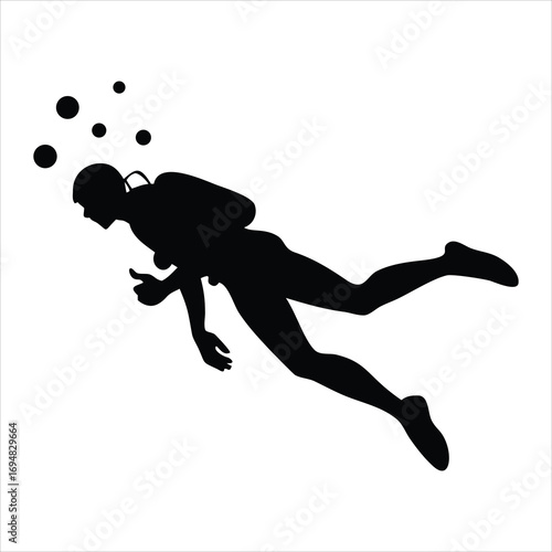 Silhouette of a diver swimming underwater with bubbles