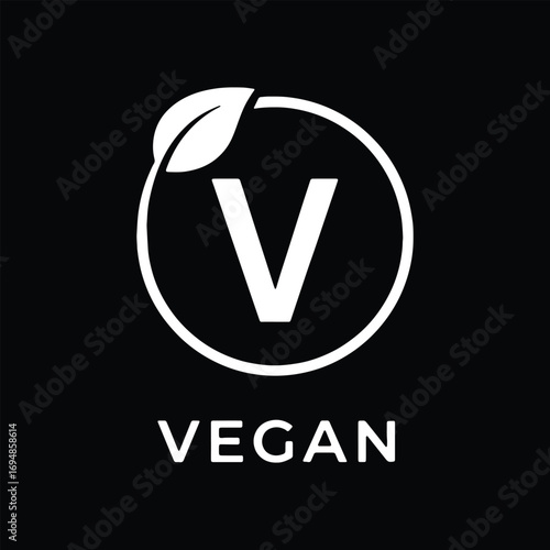 White vegan symbol with letter V and leaf on black background Keywords: vegan, veganism, symbol