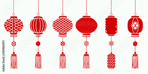 Collection of traditional red chinese lanterns with tassels hanging against a white background