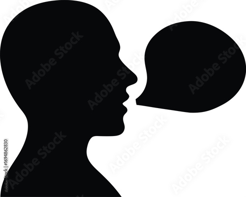 Silhouette of human head with speech bubble representing communication and expression