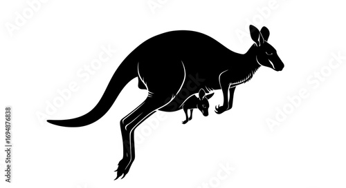 Black silhouette of a kangaroo and joey leaping
