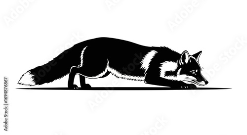 Black and white silhouette of a fox crouching