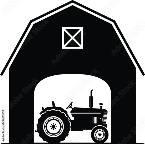 Classic tractor parked inside a rustic barn, evoking rural heritage and agricultural work.