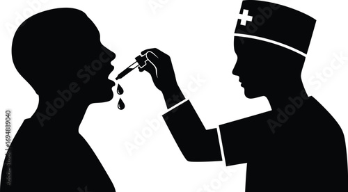 Medical professional administering liquid medicine to a patient with a dropper.