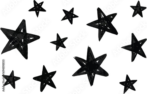 Hand drawn black stars scattered on a white background, symbolizing dreams and wishes