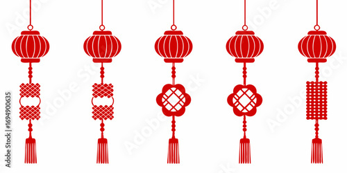 Collection of five traditional red chinese lanterns with decorative knots and tassels hanging