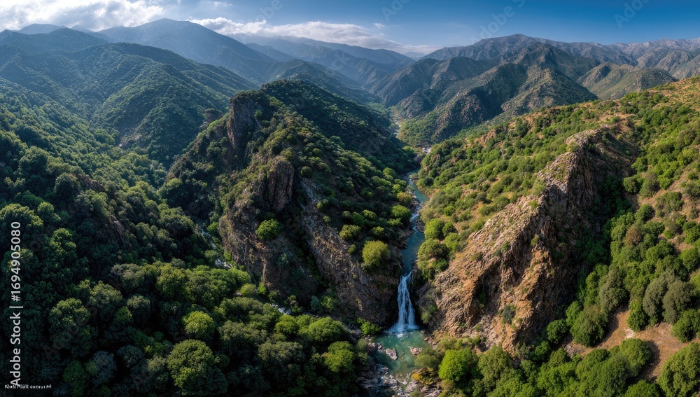 Fototapeta premium Mountainous valley with waterfall