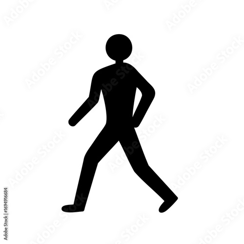 Black Silhouette of a Person Walking with Intent and Purpose Forward