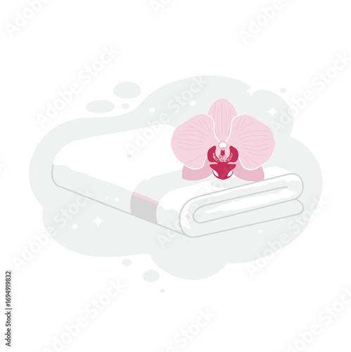 White towel with orchid: symbol of luxury and spa-style care on soft background