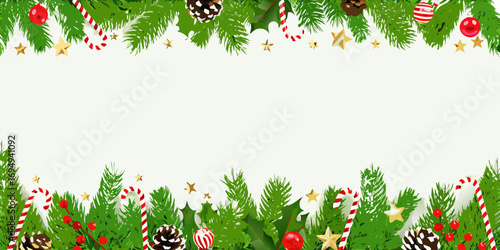 Festive christmas border with evergreen branches pine cones candy canes red berries and gold stars