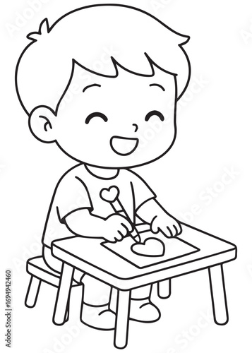 coloring book boy making craft heart on table for valentine theme